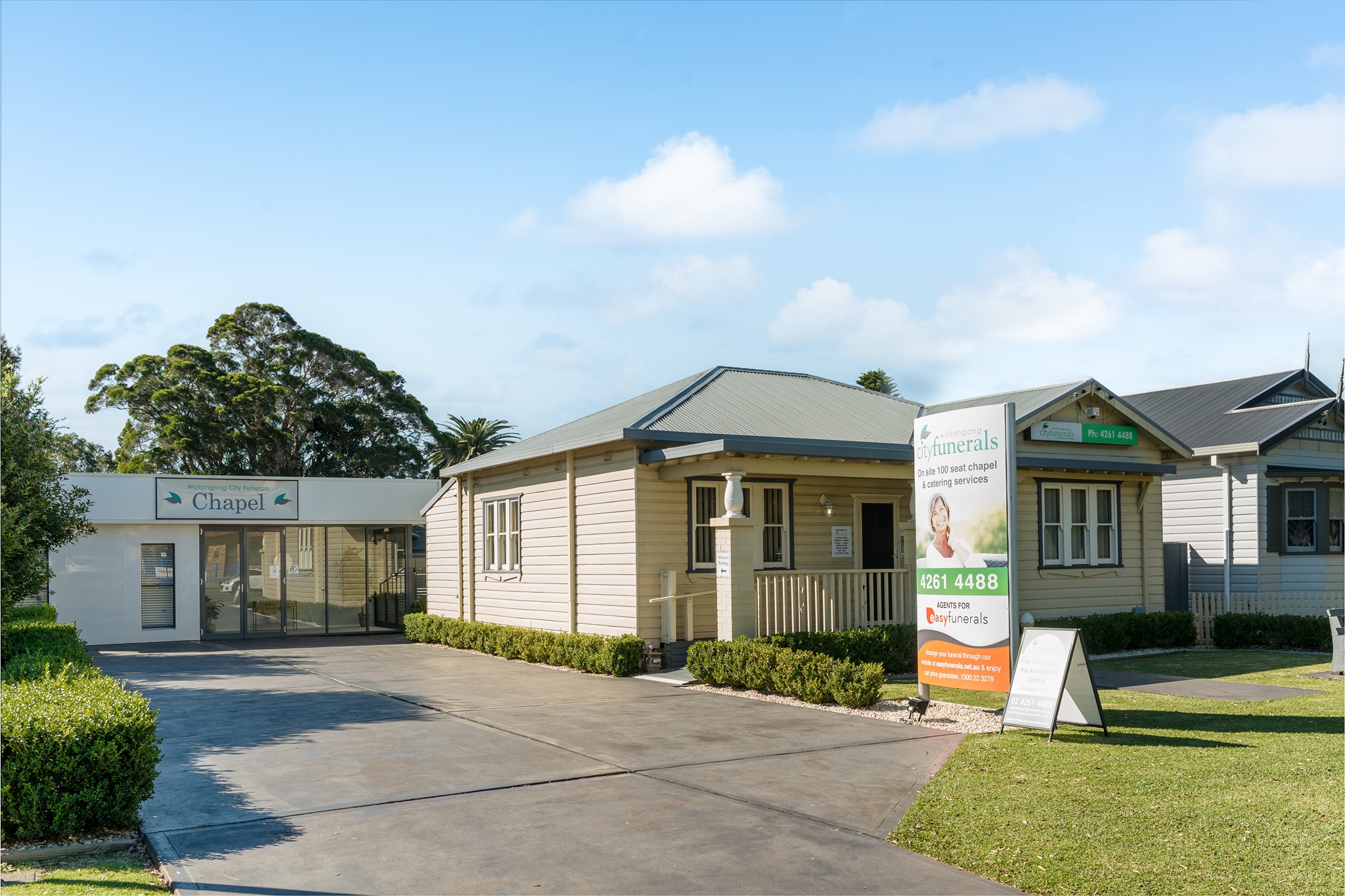 Exterior of Wollongong City Funerals Chapel showing the chapel entrance and surrounding grounds