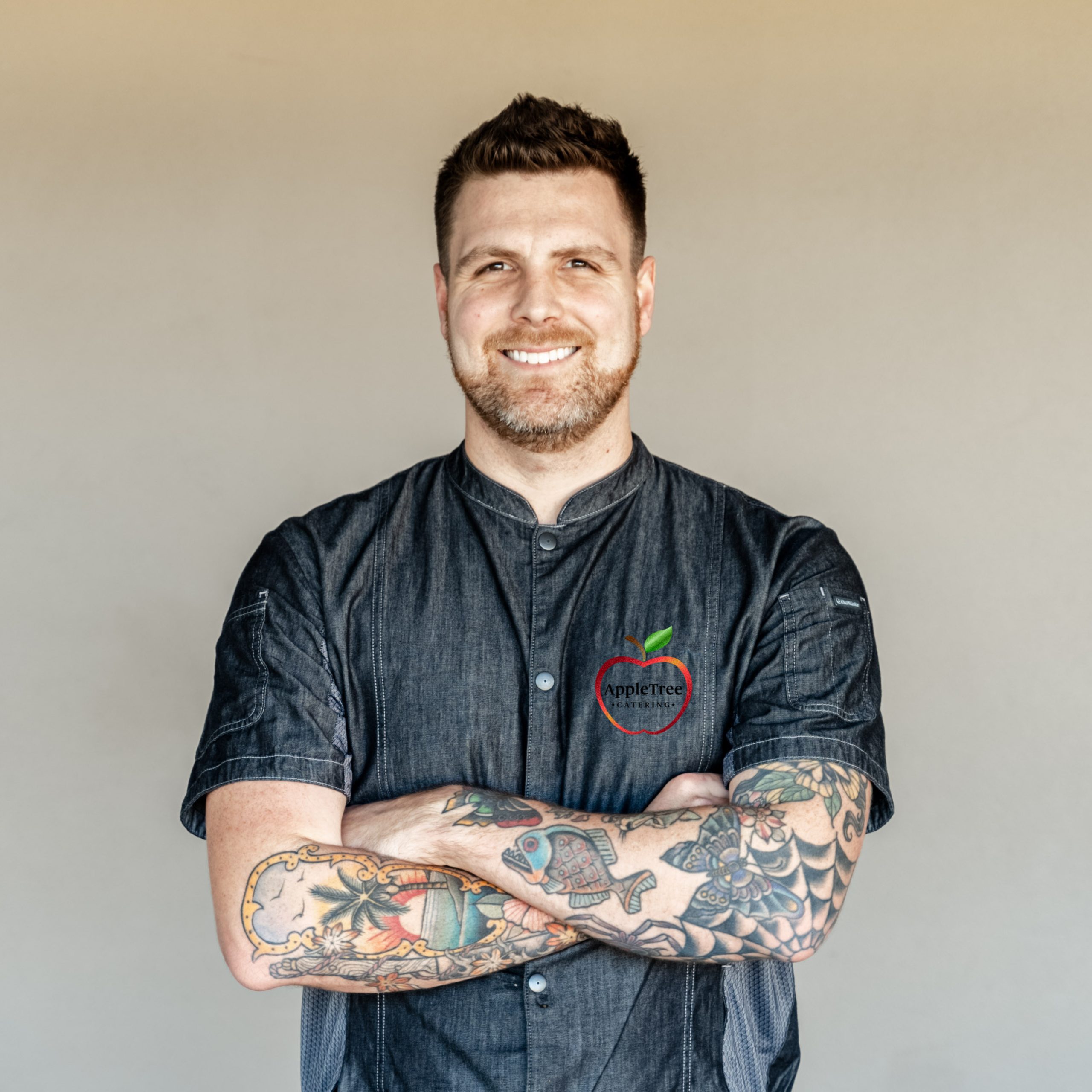 Apple Tree Catering Executive Chef wearing a branded chef uniform.